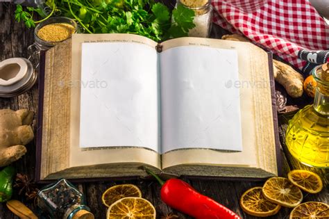 open recipe book  ingredients  wooden background stock photo  danielvincek