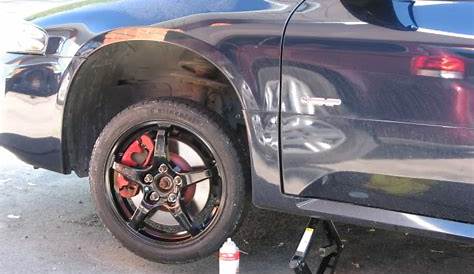 2014 cadillac cts spare tire location
