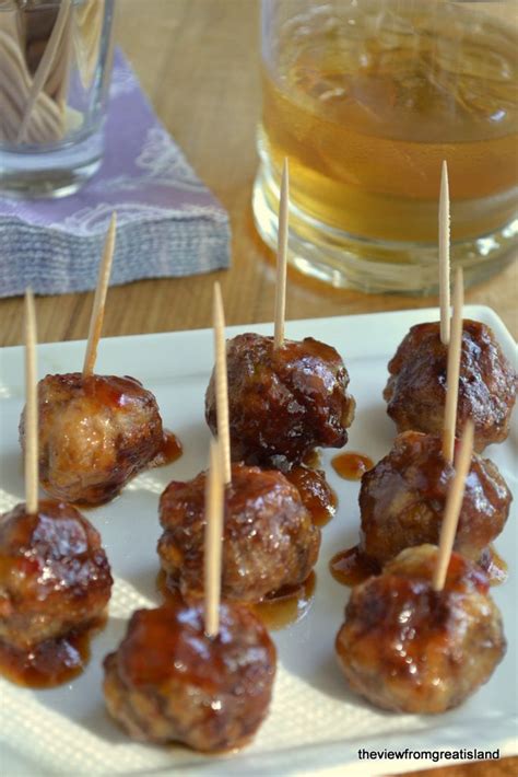 Easy and flavorful, these crockpot meatballs are a perfect dinner. Saucy Bourbon Meatballs by theviewfromgreatisland # ...