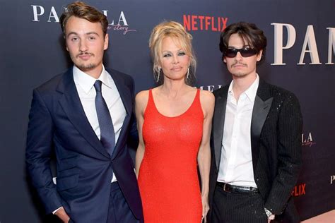 Pamela Anderson Jokes About Turning Heads In Baywatch Inspired Dress