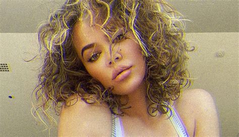 khloe kardashian is embracing her naturally curly hair after 20 years of straightening it