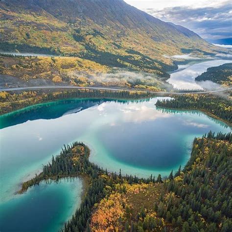 Just North Of Carcross Yukon Sits The Vibrant Emerald Lake Located On