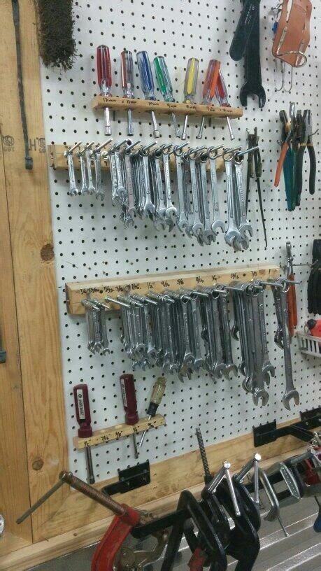 The Garage Workshop Is Filled With Lots Of Tools And Supplies
