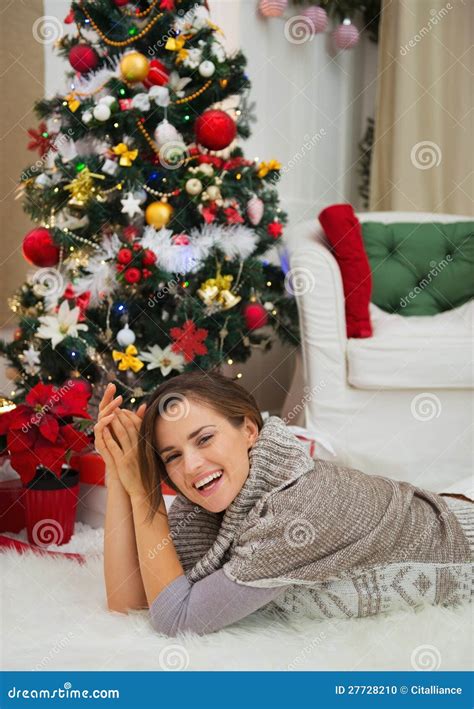 Happy Woman Laying Near Christmas Tree Stock Photo Image Of Relaxation Female