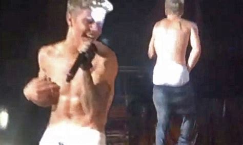 Justin Bieber Excites Singapore Fans As His Trousers Fall Precariously Low On Stage Daily Mail