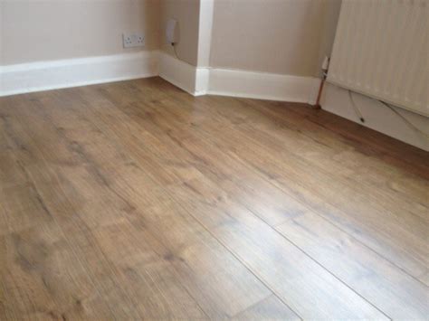 This video shows how to install scotia beading around a laminate floor. D.H Flooring: 100% Feedback, Flooring Fitter in Romford