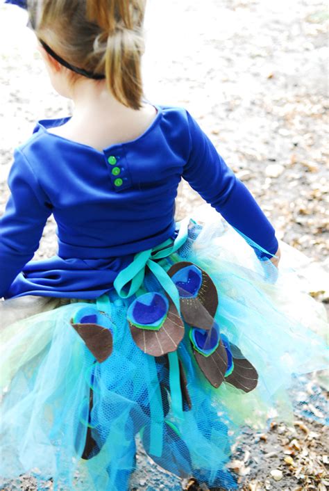 Add some feather and some orange tights and this little peacock will be so adorable. Handmade Halloween: 10 Creative Homemade Costumes With A Pumpkin & A Princess - Rae Gun Ramblings