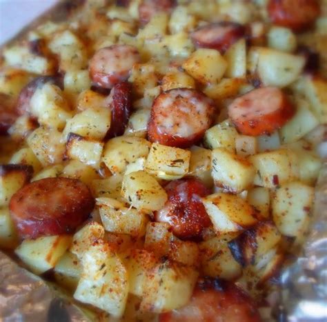 Add sausage, potatoes, peppers to pan. Oven Roasted Smoked Sausage and Potatoes | KeepRecipes ...