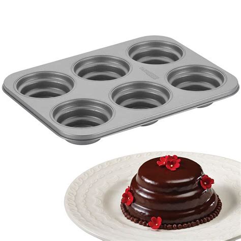 cake boss™ specialty bakeware nonstick 6 cup round cakelette pan jcpenney cake boss tiered