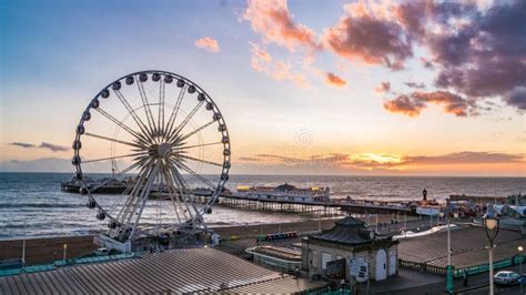 The Victorian Brighton Pier And The Brighton Wheel After Sunset