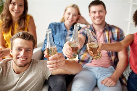 Happy Friends Drinking Beer At Home Party Stock Image Image Of