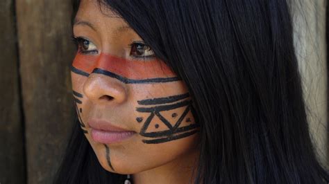 Closeup Face Of Native Brazilian Woman At An Indigenous Tribe In The