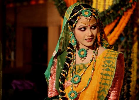 A Bride Ready For Gaye Holud Yellow Turmeric On The Body A Ceremony