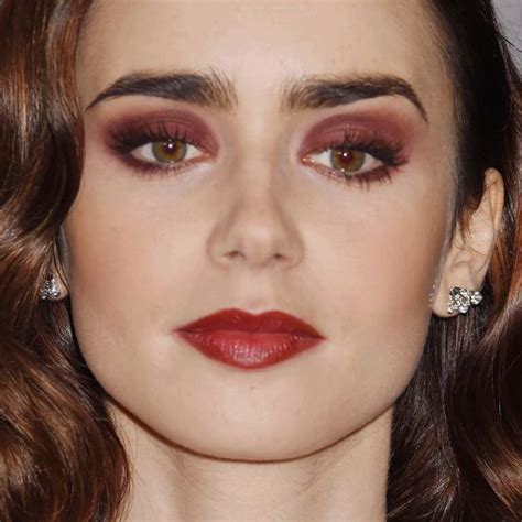 Lily Collins Makeup Black Eyeshadow Brown Eyeshadow And Red Lipstick