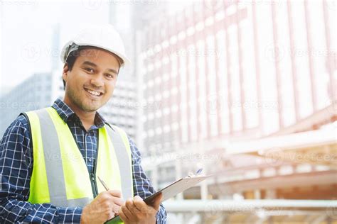 Portrait Of Engineering Asian Man Construction Worker Holding Roll