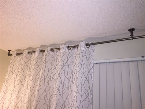 Hang curtains over vertical blinds. Pin on home decor