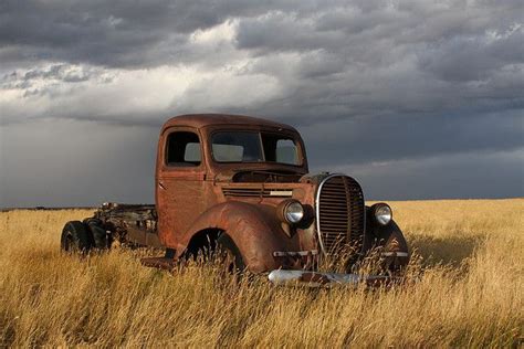 Rusty Old 1939 Ford Truck In A Field In Southern Alberta Just Minutes