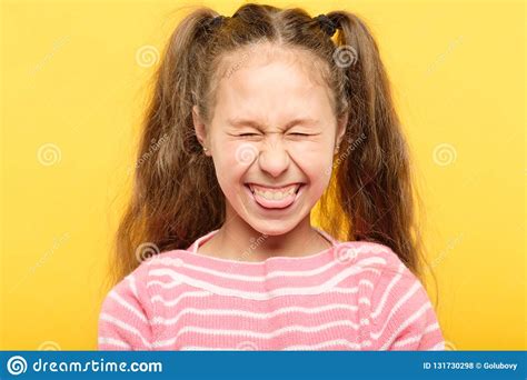 Girl Sticking Tongue Out Laughing Antics Frolicking Royalty Free Stock