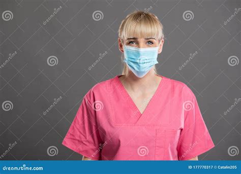 Portrait Of Young Attractive Female Nurse Wearing Face Mask Stock Image Image Of Healthcare
