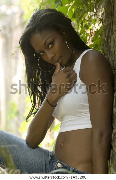 African American Woman Sitting On Porch Stock Photo Edit
