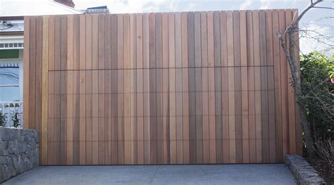 These garage doors are offered with the same options detailed with the cedar garage doors. Flushmount & Invisible Garage Door | Prestige Doors & Gates