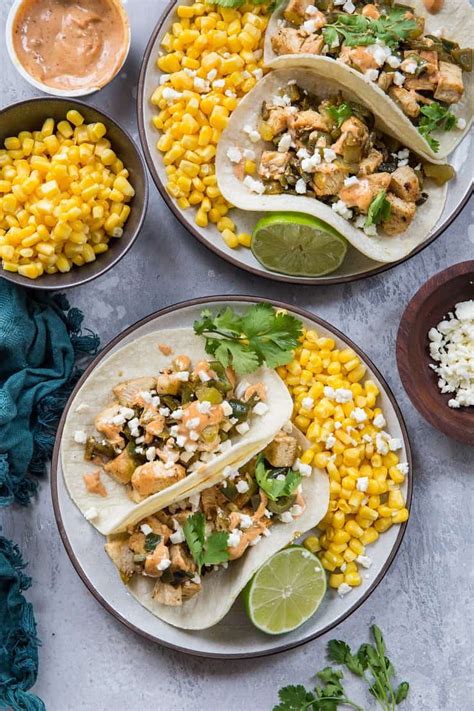 Roasted tender and topped with cotija cheese, cilantro, chili powder, and lime juice, this take on mexican street corn is sure to be a hit as a side dish, appetizer, or snack. Green Chile Chicken Tacos with Mexican Street Corn - The ...