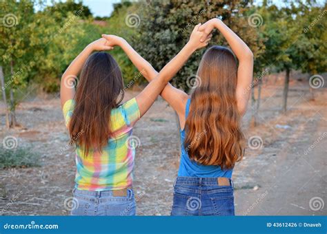 Two Best Friend Girls Making A Forever Sign Stock Photo Image Of Kids