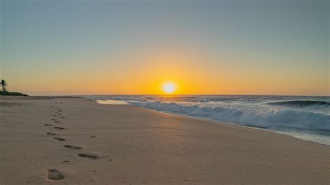 Download Wallpaper 1920x1080 Beach Sunset Footprints Sand Full Hd