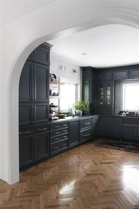 You can get both and still have a beautiful kitchen. Herringbone Hardwood Floor in Kitchen - Room For Tuesday