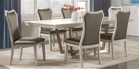 From the supple ivory and cherry brown upholstery to the patterned glass top rectangle table, this collection is a stunning addition to any contemporary dining room. Sofia Vergara Cambrian Court Ash 5 Pc Dining Room ...