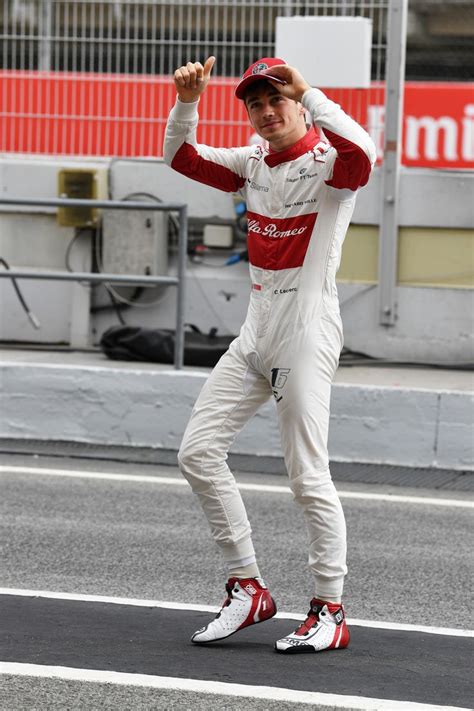 Charles Leclerc With A Thumbs Up To The Fans At The Spanish Gp After Qualifying Racing Driver
