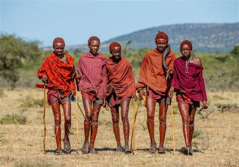 Warriors The Masai Tribe Dancing Ritual Dance Around The Fire Late In