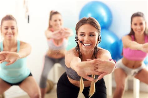 Group Of Smiling People Doing Aerobics Stock Image Image Of Fitness