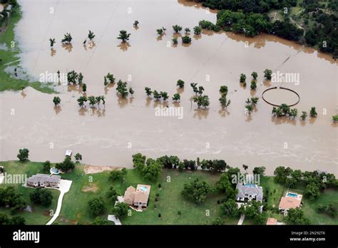 Flood Waters From The Brazos River Encroach Upon Homes In The Horseshoe