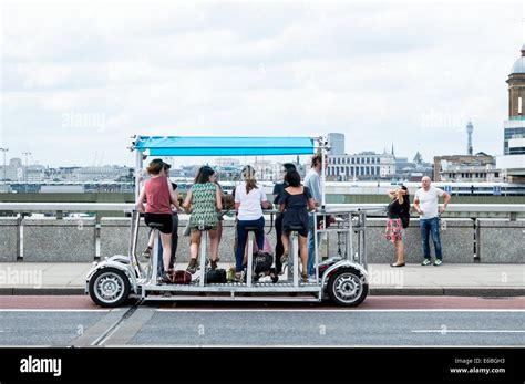 Pedibus Mulit Person Cycle On London Bridge Stock Photo Alamy