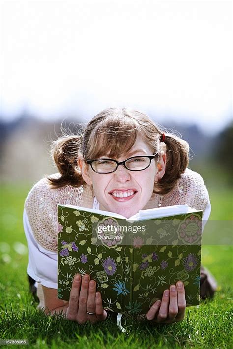 Nerd Girl Studying A Textbook High Res Stock Photo Getty Images