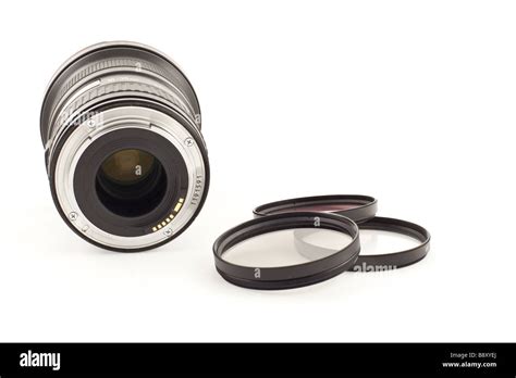 Photo Lens And Three Filters On The White Background Stock Photo Alamy