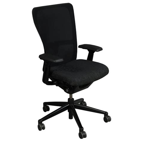 Adjusting the tension control regulates the amount of resistance a user feels when leaning back in the chair and the effort required to recline the chair backwards. Haworth Zody Used Task Chair, Black Circle Pattern | National Office Interiors and Liquidators