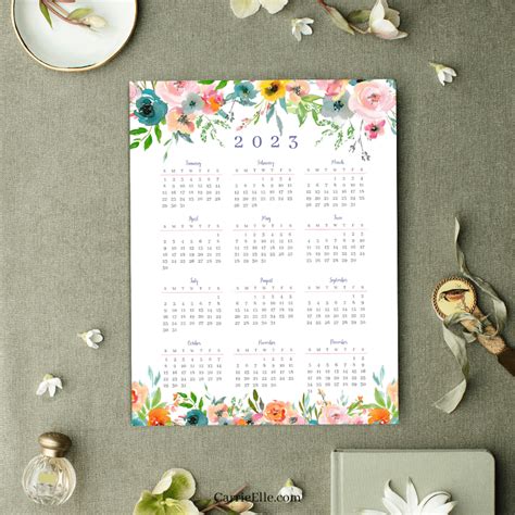 Free Printable 2023 Year At A Glance Floral Calendar Carrie Elle