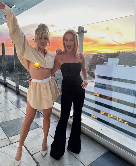 Ashley Roberts Accidentally Flashes Boobs While Posing With Co Host