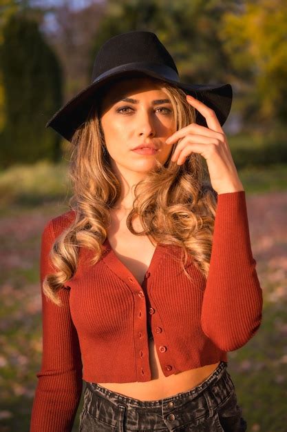 Premium Photo Autumn Lifestyle Blonde Caucasian Girl In Red Sweater