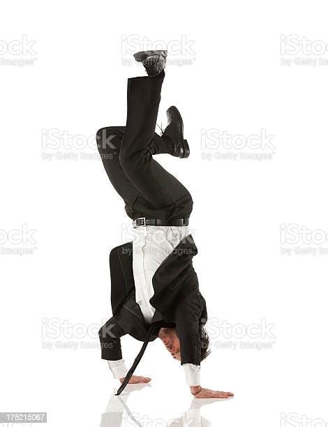 Businessman Doing Handstand Stock Photo Download Image Now