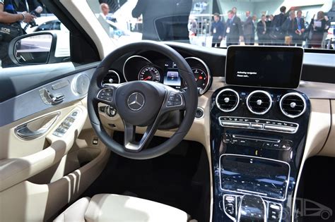 The seats are comfortable, but the rear seats aren't as spacious as the front. 2015 Mercedes-Benz C Class at 2014 NAIAS interior