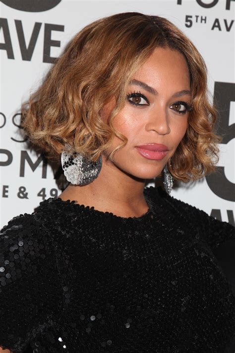 Beyoncé Reminds Us Just How Rad Varsity Jackets Are Wavy Bob Hairstyles Beyonce Short Hair