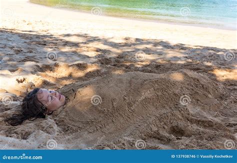Art Photo Of Beautiful Lady Buried In The Sand Stock Photo Image Of