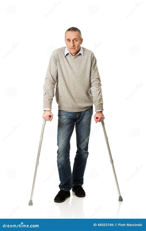 Full Length Mature Man With Crutches Stock Photo Image 48503186