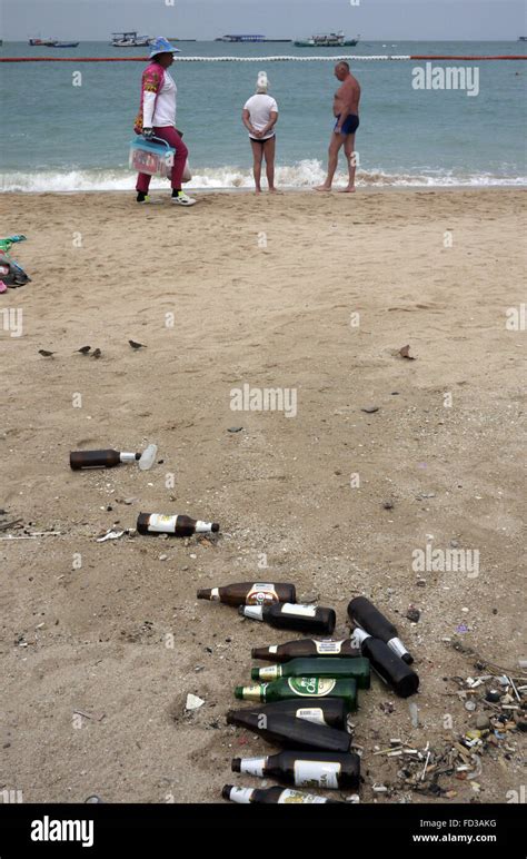 Empty Beer Bottles Left Abandoned Littering The Beach In Pattaya
