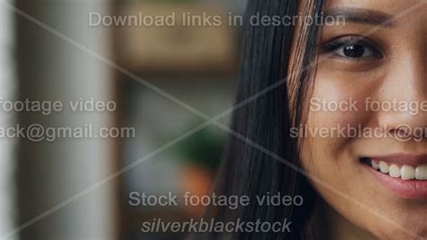 Close Up Slowmotion Portrait Of Good Looking Asian Lady Half Face With Dark Eye Beautiful Skin
