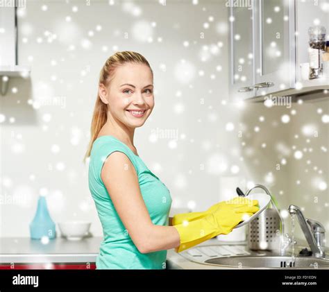 Happy Woman Washing Dishes At Home Kitchen Stock Photo Alamy