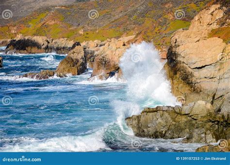 Surf Breaking On Cliffs Along The Beautiful Big Sur Coast In California